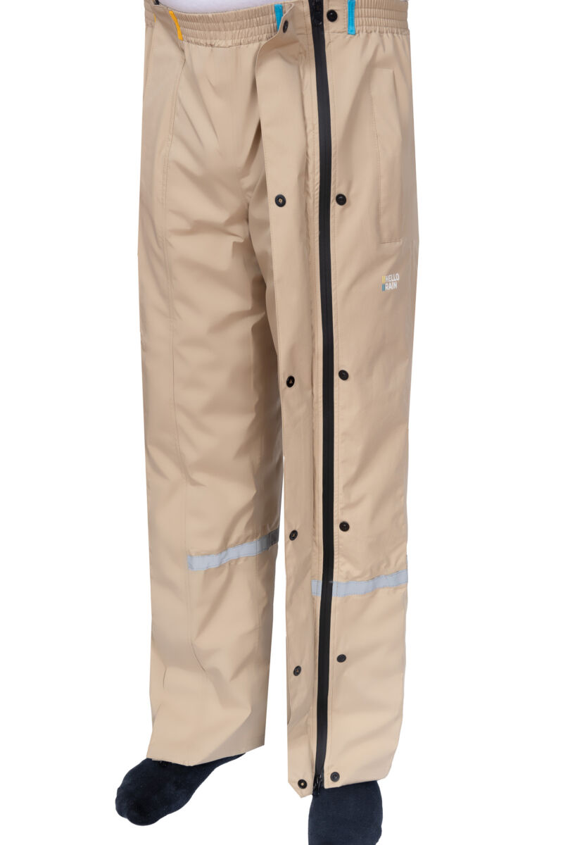 Product afbeelding van beige premium regenbroek met zichtbaarheid op ritssluiting.